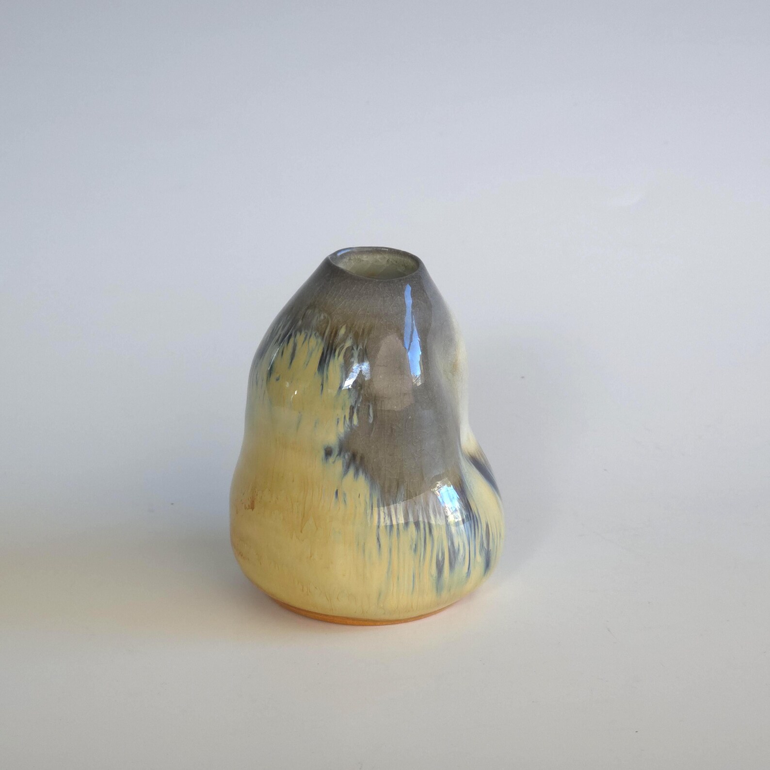 Small soda-fired bud vase with rutile slip